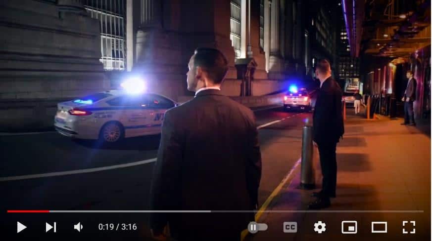 Screenshot of "DSS: Anywhere" video showing a group of DSS Special Agents on a street in New York.