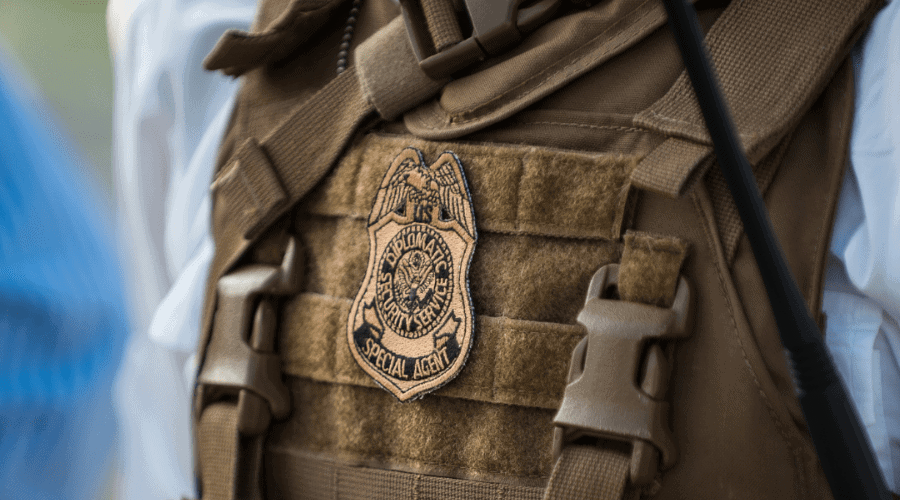 Photo of DSS Special Agent badge and vest.