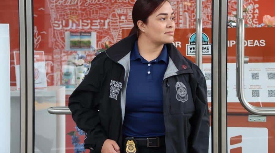 Female DSS Special Agent with badge showing